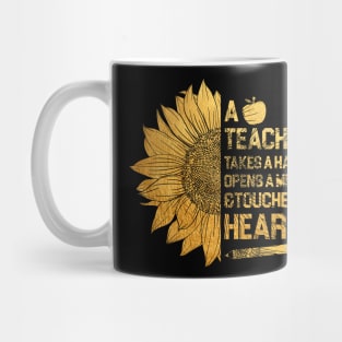 a teacher takes a hand opens a mind and touches a heart Gold Mug